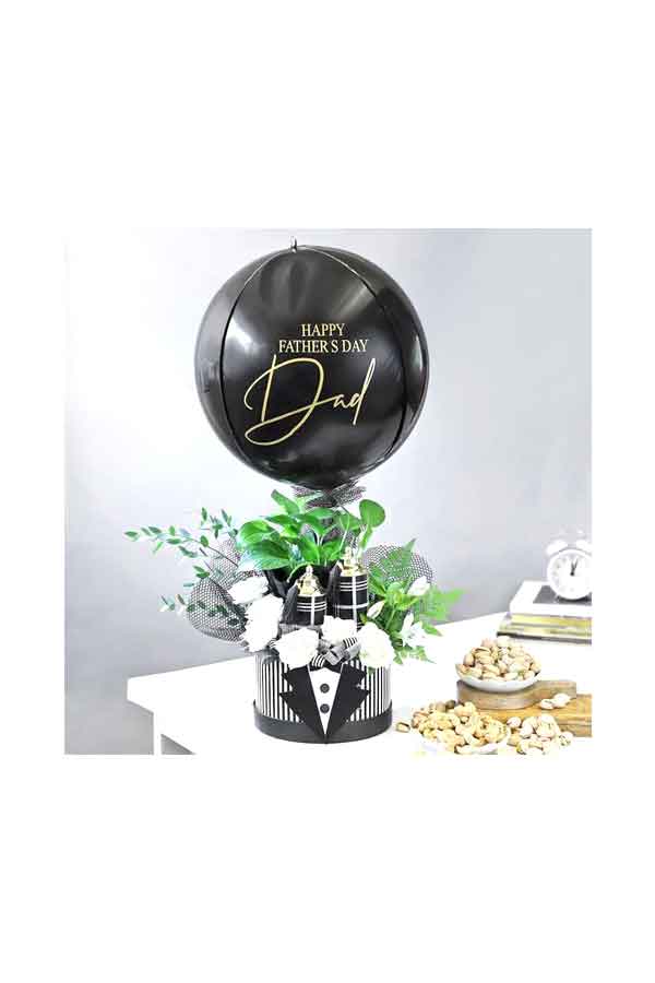 Special gift hamper with plants, pots, and gardening tools for Father's Day