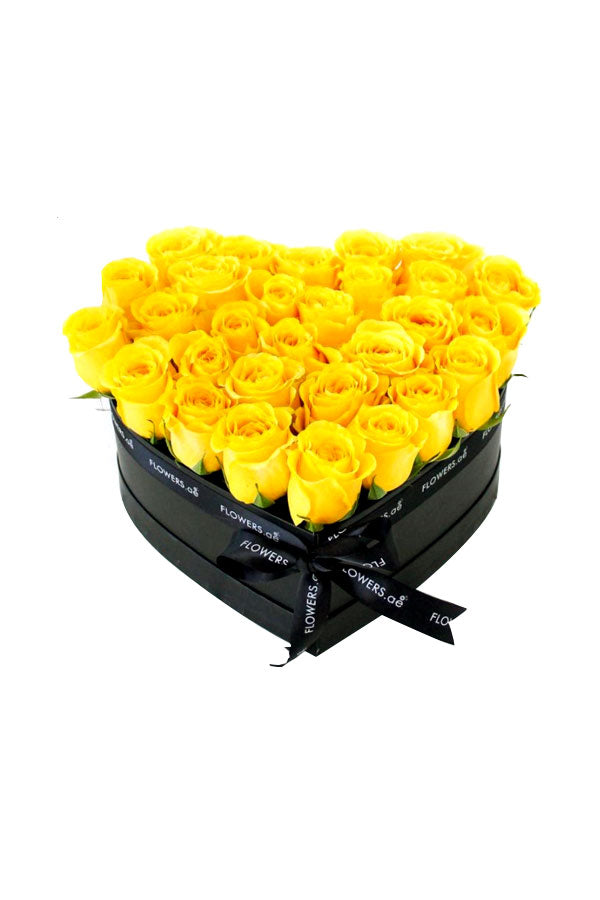 Majestic Yellow Roses – vibrant yellow roses with lush greenery arranged in an elegant gift box, ideal for celebrating special moments and expressing joy.