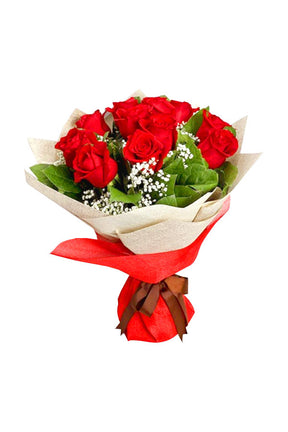 Blush of Love red roses bouquet wrapped in elegant decorative paper