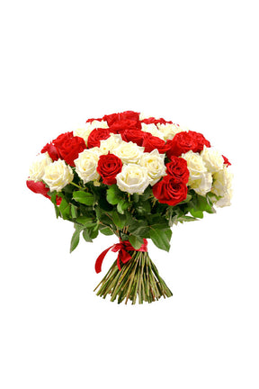Fresh cut roses in red and white tied as a romantic bouquet
